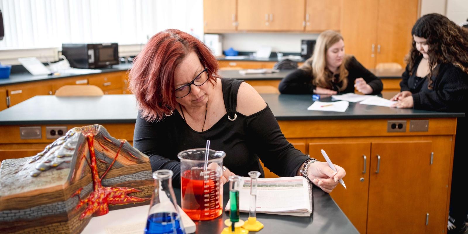 Student working in chem lab